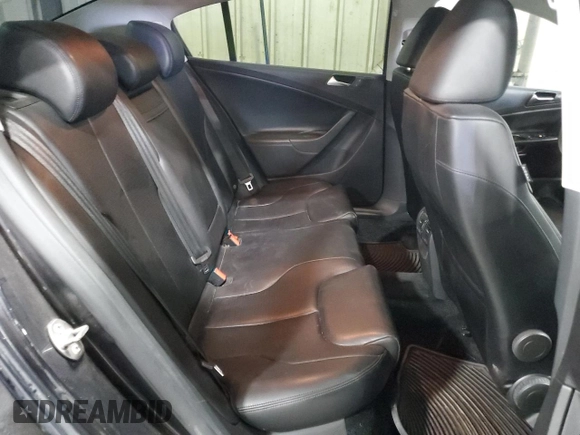 2010 Volkswagen Passat z VIN WVWJK9AN4AE096359, wystawiony jako Copart lot #50740075 z przebiegiem 196 126 mil mil oraz Szkoda całkowita • Salvage title. Historia ofert i sprzedaży dostępna na DreamBid. Obrazek 10.