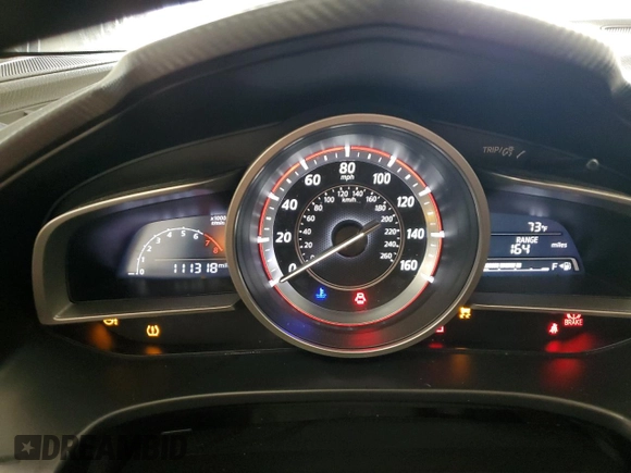 2015 Mazda 3 i Grand Touring z VIN 3MZBM1W7XFM155147, wystawiony jako Copart lot #58413555 z przebiegiem 111 318 mil mil oraz Szkoda całkowita • Salvage title. Historia ofert i sprzedaży dostępna na DreamBid. Obrazek 9.
