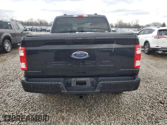2023 Ford F-150 XL with VIN 1FTEW1EB4PKF59134, listed as a Copart auction lot 85747264 with 25,038 mi miles and Salvage Title. Bid and sale history available at carsss.com. Image 6.