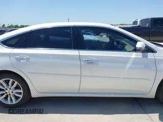 2014 Toyota Avalon Limited with VIN 4T1BK1EB2EU083624, listed as a IAAI auction lot 41963742 with 94,140 mi miles. Bid and sale history available at carsss.com. Image 14.