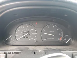 1996 Subaru Legacy Outback with VIN 4S3BG685XT7984194, listed as a Copart auction lot 77999224 with 130,804 mi miles and Salvage title. Bid and sale history available at DreamBid. Image 9.