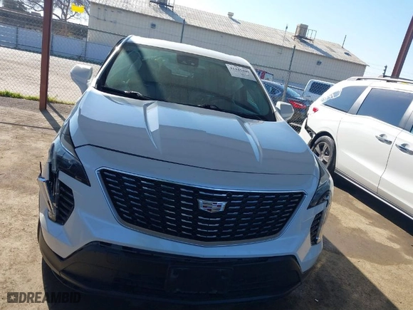 2020 Cadillac XT4 FWD Luxury with VIN 1GYAZAR45LF039362, listed as a IAAI auction lot 41445409 with 76,869 mi miles. Bid and sale history available at carsss.com. Image 13.