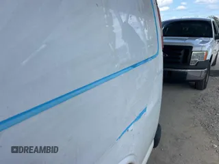 2014 Chevrolet Express Cargo z VIN 1GCWGFCA4E1121385, wystawiony jako IAAI lot #42357304 z przebiegiem 205 265 mil mil oraz . Historia ofert i sprzedaży dostępna na DreamBid. Obrazek 1.