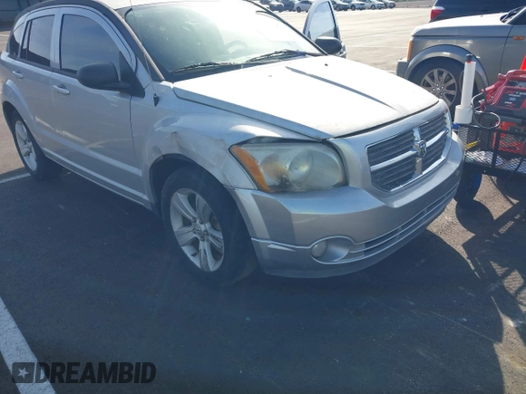 2011 Dodge Caliber Mainstreet with VIN 1B3CB3HA2BD117839, listed as a IAAI auction lot 42101103 with 142,099 mi miles. Bid and sale history available at carsss.com. Image 6.