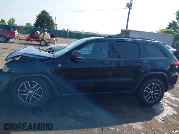 2018 Jeep Grand Cherokee Trailhawk with VIN 1C4RJFLG4JC241057, listed as a IAAI auction lot 42416590 with 81,822 mi miles and . Bid and sale history available at DreamBid. Image 14.