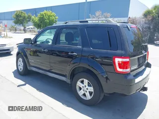 2009 Ford Escape Hybrid with VIN 1FMCU59369KB78293, listed as a IAAI auction lot 42478254 with 145,158 mi miles and . Bid and sale history available at DreamBid. Image 3.