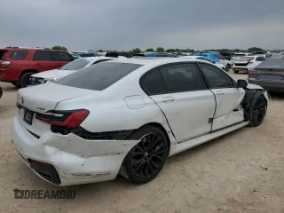 2021 BMW 7 Series 740i with VIN WBA7T2C06MCF88813, listed as a Copart auction lot 49589555 with 60,802 mi miles and Salvage title. Bid and sale history available at DreamBid. Image 3.