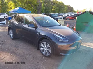 2024 Tesla Model Y Long Range z VIN 7SAYGDEE4RA283298, wystawiony jako IAAI lot #42285143 z przebiegiem 9 322 mil mil oraz . Historia ofert i sprzedaży dostępna na DreamBid. Obrazek 1.