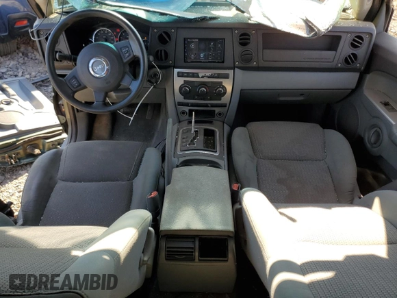 2007 Jeep Commander Sport with VIN 1J8HG48K27C663745, listed as a Copart auction lot 75741314 with 194,534 mi miles and Salvage Title. Bid and sale history available at carsss.com. Image 8.