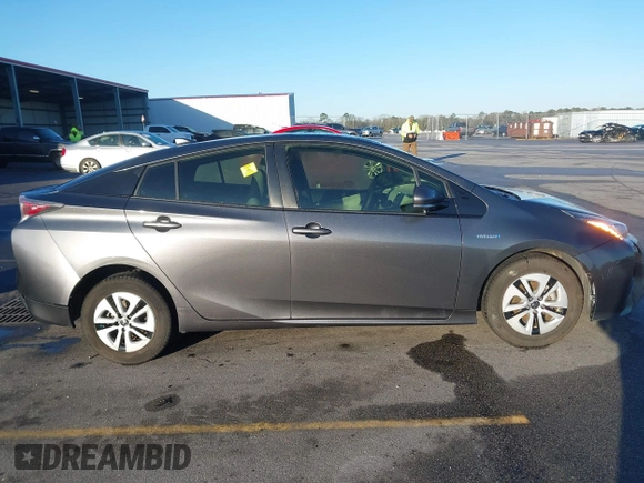 2017 Toyota Prius Two z VIN JTDKARFU4H3042976, wystawiony jako IAAI lot #41740418 z przebiegiem 66 734 mil mil oraz . Historia ofert i sprzedaży dostępna na DreamBid. Obrazek 13.