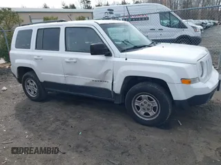2015 Jeep Patriot Sport with VIN 1C4NJRBBXFD317811, listed as a IAAI auction lot 41579467 with 107,002 mi miles and . Bid and sale history available at carsss.com. Image 6.