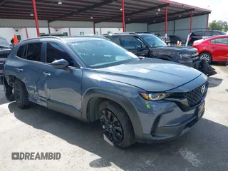 2023 Mazda CX-50 S Select with VIN 7MMVABAM6PN107065, listed as a IAAI auction lot 42553598 with 69,550 mi miles and . Bid and sale history available at DreamBid. Image 1.