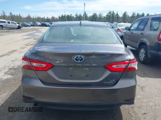 2019 Toyota Camry Hybrid LE z VIN 4T1B31HK0KU509265, wystawiony jako IAAI lot #42014204 z przebiegiem 136 560 mil mil oraz . Historia ofert i sprzedaży dostępna na DreamBid. Obrazek 19.