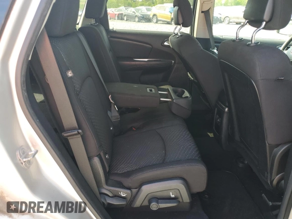2014 Dodge Journey SXT z VIN 3C4PDCBG7ET126901, wystawiony jako Copart lot #52882625 z przebiegiem 176 923 mil mil oraz Szkoda całkowita • Salvage title. Historia ofert i sprzedaży dostępna na DreamBid. Obrazek 10.