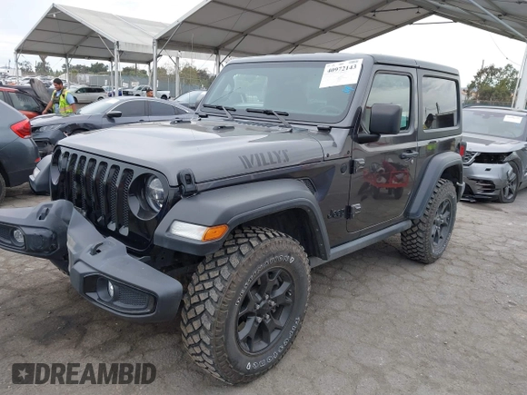 2022 Jeep Wrangler Willys Sport with VIN 1C4GJXAN7NW252931, listed as a IAAI auction lot 40972143 with 12,823 mi miles and . Bid and sale history available at DreamBid. Image 17.