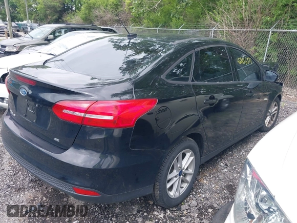 2018 Ford Focus SE with VIN 1FADP3F24JL248653, listed as a IAAI auction lot 42416377 with 113,856 mi miles and . Bid and sale history available at DreamBid. Image 4.
