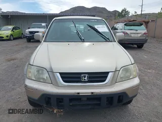 2000 Honda CR-V SE with VIN JHLRD1874YC046995, listed as a IAAI auction lot 42033059 with 218,484 mi miles. Bid and sale history available at carsss.com. Image 6.