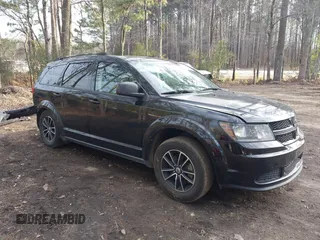 2018 Dodge Journey SE with VIN 3C4PDCAB3JT381836, listed as a IAAI auction lot 41351586 with 130,996 mi miles. Bid and sale history available at carsss.com. Image 1.