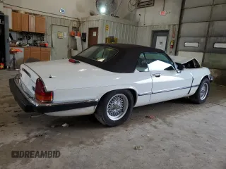 1989 Jaguar XJS z VIN SAJNV4847KC151989, wystawiony jako Copart lot #61401054 z przebiegiem 80 570 mil mil oraz Szkody całkowita. Historia ofert i sprzedaży dostępna na DreamBid. Obrazek 3.
