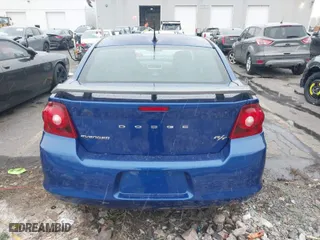 2013 Dodge Avenger R/T with VIN 1C3CDZBG6DN587236, listed as a IAAI auction lot 40826123 with 113,647 mi miles. Bid and sale history available at carsss.com. Image 17.