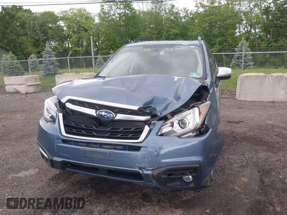 2018 Subaru Forester Touring with VIN JF2SJAWC5JH528330, listed as a IAAI auction lot 42344618 with 62,446 mi miles and . Bid and sale history available at DreamBid. Image 6.