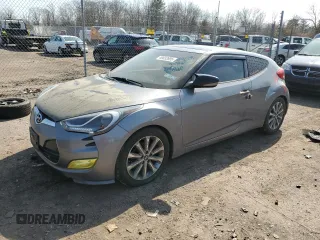 2012 Hyundai Veloster w/Black Int с VIN KMHTC6AD6CU044263, выставлен на аукционе Copart как лот 49032695 с пробегом 165 744 миль миль и Списание • Salvage title. История ставок и продаж доступна на DreamBid. Изображение 1.