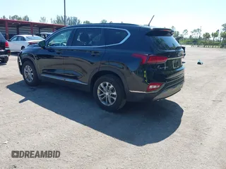 2019 Hyundai Santa Fe SE with VIN 5NMS23AD4KH088902, listed as a IAAI auction lot 42044465 with 34,302 mi miles and . Bid and sale history available at DreamBid. Image 3.