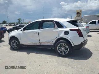 2021 Cadillac XT5 FWD Premium Luxury z VIN 1GYKNCR44MZ106982, wystawiony jako Copart lot #62234455 z przebiegiem 93 079 mil mil oraz Szkoda całkowita • Salvage title. Historia ofert i sprzedaży dostępna na DreamBid. Obrazek 2.