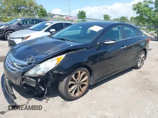 2014 Hyundai Sonata Limited with VIN 5NPEC4AB3EH841311, listed as a IAAI auction lot 42010642 with 148,558 mi miles and . Bid and sale history available at DreamBid. Image 2.