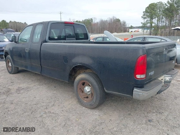 1999 Ford F-150 Work Series with VIN 1FTRX17W7XNC31381, listed as a IAAI auction lot 41734799 with 122,035 mi miles. Bid and sale history available at carsss.com. Image 3.