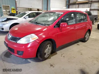 2009 Nissan Versa 1.8 S with VIN 3N1BC13EX9L355287, listed as a Copart auction lot 87203574 with NaN miles and Salvage Title. Bid and sale history available at carsss.com. Image 1.