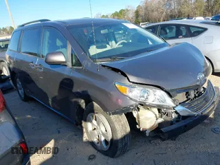2014 Toyota Sienna LE AAS with VIN 5TDKK3DC5ES422228, listed as a IAAI auction lot 41844899 with 243,107 mi miles and . Bid and sale history available at DreamBid. Image 1.