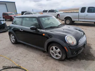 2010 MINI Cooper Hardtop with VIN WMWMF3C5XATZ25746, listed as a Copart auction lot 51662415 with 139,411 mi miles and Salvage Title. Bid and sale history available at carsss.com. Image 4.