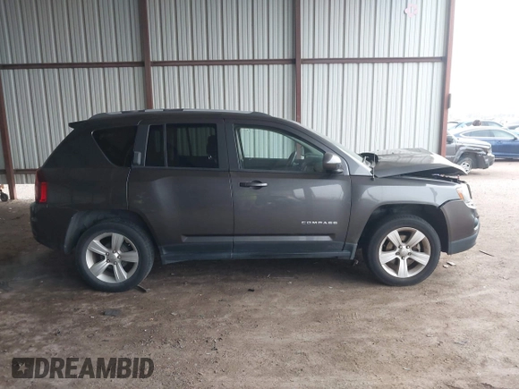2016 Jeep Compass Latitude with VIN 1C4NJCEA2GD599833, listed as a IAAI auction lot 41507729 with 107,187 mi miles. Bid and sale history available at carsss.com. Image 14.