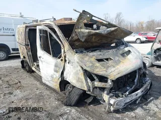 2021 Ford Transit z VIN 1FTBR1YGXMKA98700, wystawiony jako IAAI lot #41805164 z przebiegiem Nie podano mil oraz . Historia ofert i sprzedaży dostępna na DreamBid. Obrazek 1.