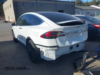 2021 Tesla Model X Long Range Plus with VIN 5YJXCDE29MF316169, listed as a IAAI auction lot 41232066 with 53,235 mi miles and . Bid and sale history available at carsss.com. Image 3.