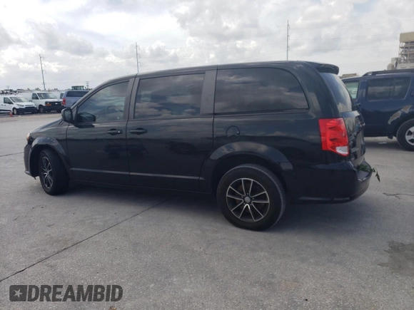 2018 Dodge Grand Caravan SE Plus with VIN 2C4RDGBG2JR199767, listed as a Copart auction lot 54182325 with 137,522 mi miles and Salvage Title. Bid and sale history available at DreamBid. Image 2.