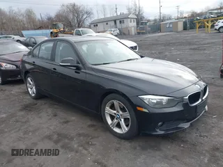 2014 BMW 3 Series 320i xDrive with VIN WBA3C3G59ENS70388, listed as a IAAI auction lot 41962815 with 195,393 mi miles. Bid and sale history available at carsss.com. Image 1.
