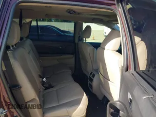 2017 Honda Pilot Touring with VIN 5FNYF5H96HB038413, listed as a IAAI auction lot 42594065 with 130,501 mi miles and . Bid and sale history available at DreamBid. Image 8.
