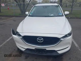 2017 Mazda CX-5 Touring with VIN JM3KFACL5H0189296, listed as a IAAI auction lot 42042328 with 60,208 mi miles and . Bid and sale history available at carsss.com. Image 12.