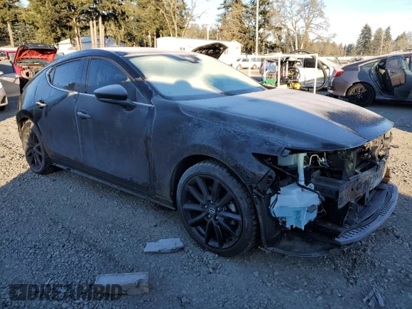2022 Mazda Mazda3 Hatchback Premium with VIN JM1BPBML0N1519877, listed as a Copart auction lot 41886985 with 27,528 mi miles and Salvage Title. Bid and sale history available at carsss.com. Image 4.