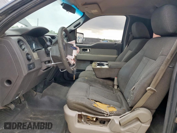 2009 Ford F-150 XL with VIN 1FTRF12W89KB74882, listed as a Copart auction lot 60924495 with 401,265 mi miles and Salvage title. Bid and sale history available at DreamBid. Image 7.