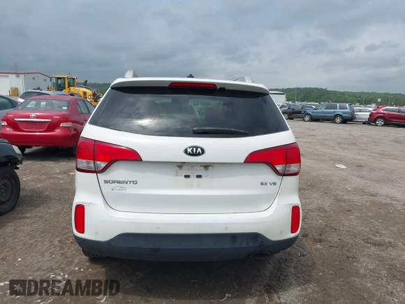 2015 Kia Sorento EX with VIN 5XYKU4A71FG647090, listed as a IAAI auction lot 42100215 with 121,842 mi miles. Bid and sale history available at carsss.com. Image 17.