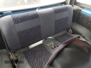 1994 Geo Tracker z VIN 2CNBE18U1R6918878, wystawiony jako Copart lot #75894834 z przebiegiem Nie podano mil oraz Nie do naprawy. Historia ofert i sprzedaży dostępna na DreamBid. Obrazek 10.