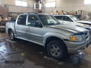 2004 Ford Explorer Sport Trac XLS z VIN 1FMZU77K84UB99207, wystawiony jako IAAI lot #41621860 z przebiegiem 126 634 mil mil oraz . Historia ofert i sprzedaży dostępna na DreamBid. Obrazek 1.
