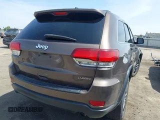 2020 Jeep Grand Cherokee Altitude with VIN 1C4RJEAG3LC220295, listed as a IAAI auction lot 42118183 with 104,097 mi miles and . Bid and sale history available at DreamBid. Image 4.