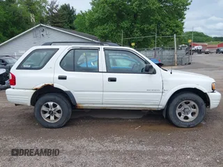 2000 Isuzu Rodeo z VIN 4S2DM58W6Y4312571, wystawiony jako IAAI lot #42253955 z przebiegiem 84 517 mil mil oraz . Historia ofert i sprzedaży dostępna na DreamBid. Obrazek 13.