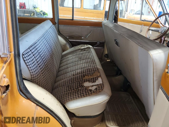 1972 Jeep Grand Wagoneer with VIN J2A144CN29869, listed as a Copart auction lot 73240394 with 83,806 mi miles and Clean title. Bid and sale history available at DreamBid. Image 11.