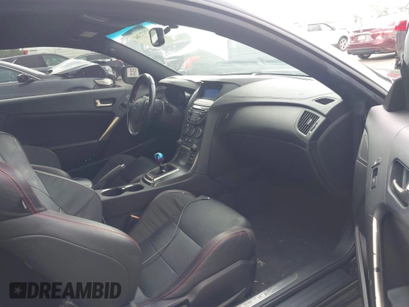 2015 Hyundai Genesis Coupe 3.8L Base z VIN KMHHU6KJ7FU126210, wystawiony jako IAAI lot #42371364 z przebiegiem 92 719 mil mil oraz . Historia ofert i sprzedaży dostępna na DreamBid. Obrazek 5.