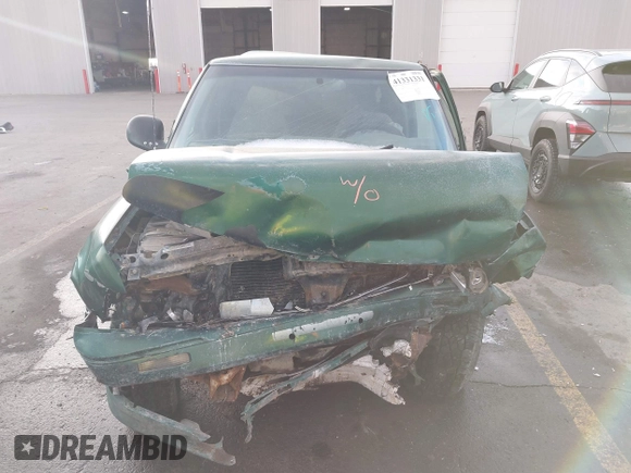 1997 GMC Sonoma SLS with VIN 1GTDT19X0V8502966, listed as a IAAI auction lot 41331331 with 308,584 mi miles. Bid and sale history available at carsss.com. Image 11.